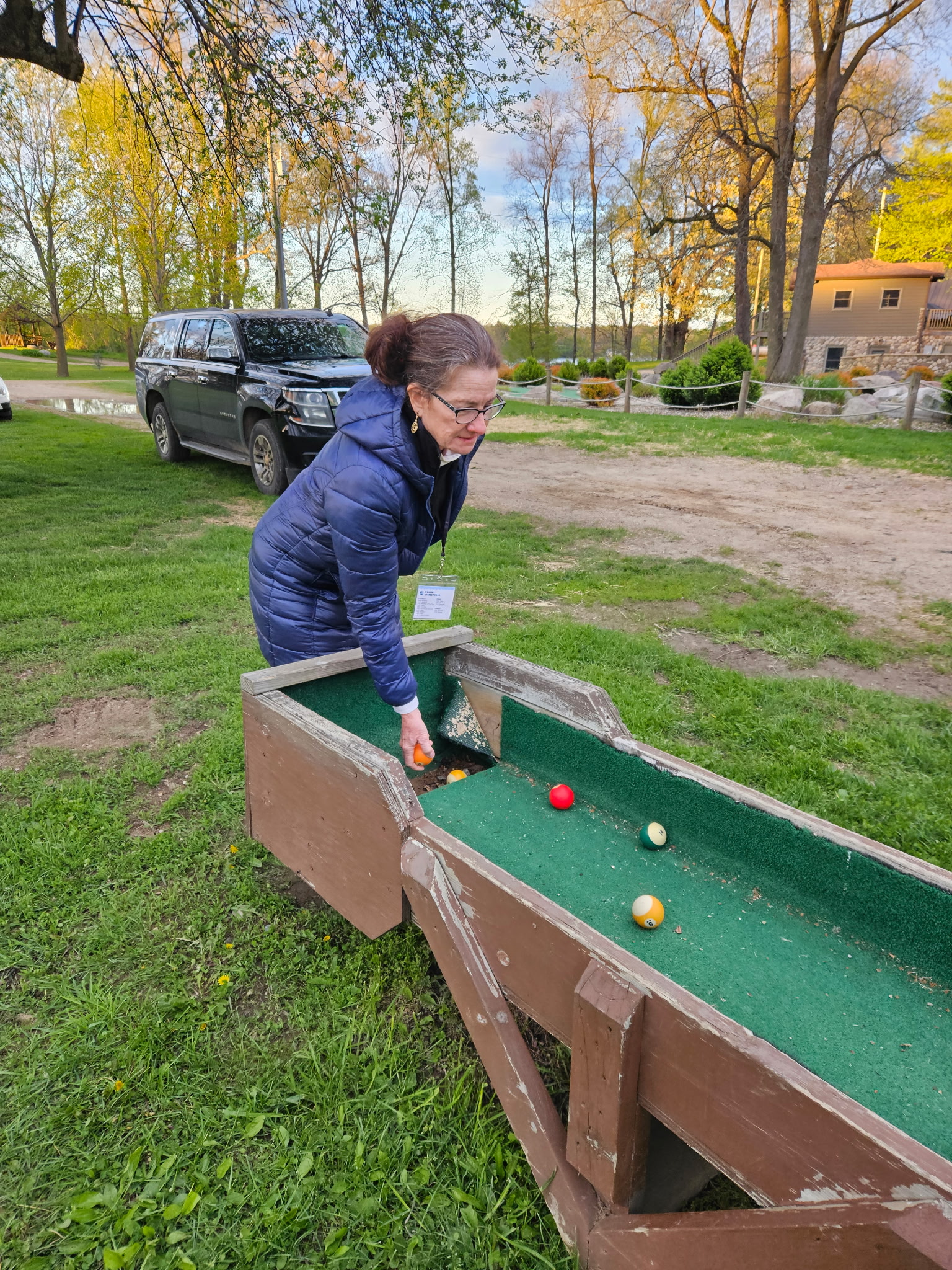 20260501_201132 Karina at Bair Lake Bible Camp playing carpetball.